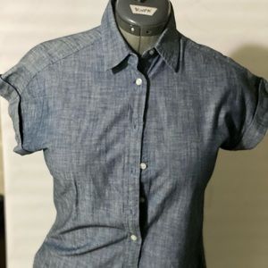 This is a short sleeve jeans blue denim shirt.